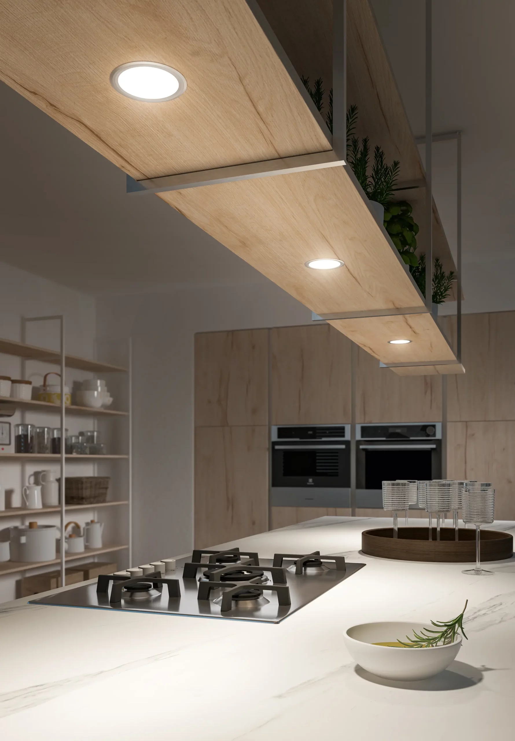 Moderne Küche mit eingebauten LED-Spots über Kochinsel. Cuisine moderne avec spots LED encastrés au-dessus de l’îlot.